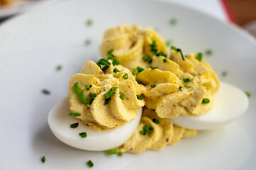 Traditional basic starter by traditional french cheap restaurants bouillons in Paris, Lyon, Toulouse, oeufs eggs mimosa with mayonnaise sauce