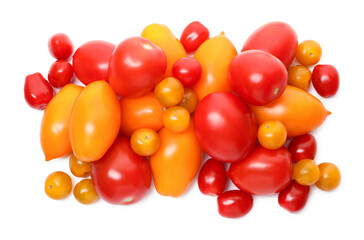 Heap of different ripe juicy tomatoes isolated on white, top view