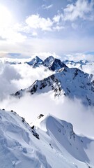 Snowy mountain peaks pierce a sky of clouds
