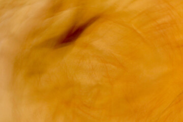 Golden Yellow and Orange Abstract Background with Dark Soft Accents, Perfect for Celebration Themes, Festive Invitations, and Elegant Party Designs