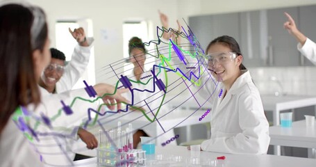 Teacher tapping chart in science class guiding students raising fingers writing notes and analyzing - Powered by Adobe