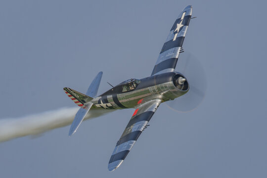 Republic P-47 Thunderbolt Warbird in Flight with Smoke Trail
