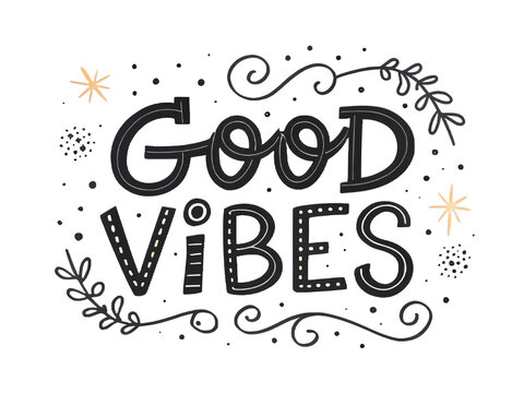 Good vibes hand lettering with decorative flourishes and stars
