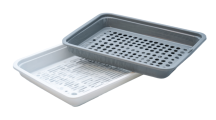 Two rectangular plastic food containers, one gray, one white, stacked.  Both feature a perforated pattern bottom