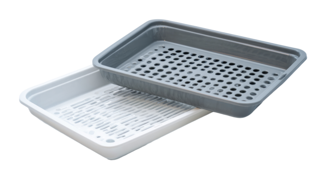 Two rectangular plastic food containers, one gray, one white, stacked.  Both feature a perforated pattern bottom