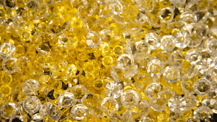 Bright festive background. Silver and golden crystals on a dark background.