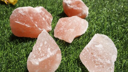 Blocks of Rock Salt in plate. Himalayan Rock salt unrefined with minerals beneficial for health and ayurvedic rituals
