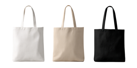 Three blank canvas tote bags in white, beige, and black