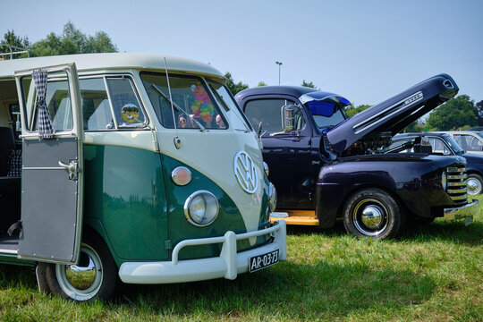 Classic VW Bulli van and vintage Ford truck at Oldtimerdag Ruinerwold show
