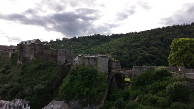 Discover bouillon castle in belgium surrounded by lush ardennes beauty