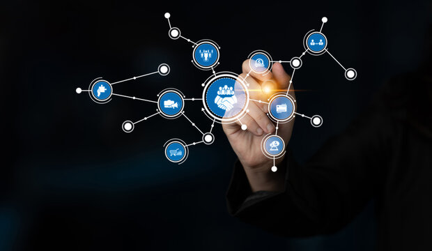 A hand interacts with digital icons depicting business collaboration on a dark background, showcasing concepts of networking, partnership, and innovation. Tessel