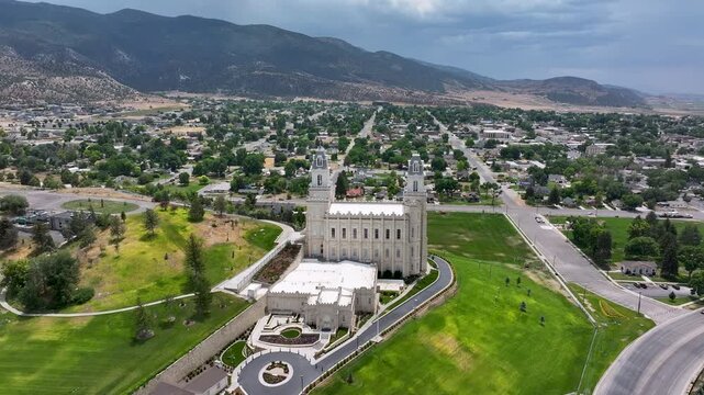 Aerial Manti Utah LDS Temple mountain Valley circle 1.  The Church of Jesus Christ of Latter-day Saints, LDS, Mormon religion. Pioneer built construction. Complete in 1888 Christian religious.