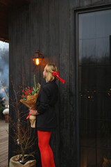 beautiful woman in Christmas style. Girl walk at the street in new year mood