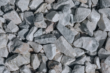 Close-up of gray crushed stones – natural gravel texture