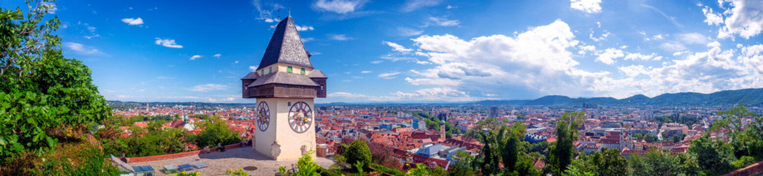 Panoramic view with Castle Hill (Schlo&szlig;berg) and famous clock tower (Uhrturm) on Graz in Styria, Austria