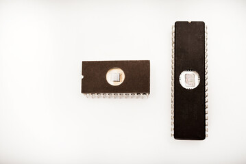 Several different chips on a white background. Old electronic chips.