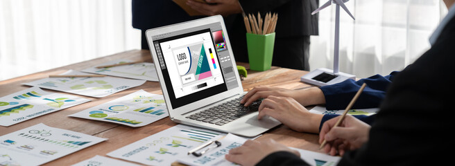 Graphic designer software for modern design of web page and commercial brisk ads showing on the...