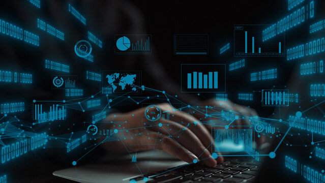 A close-up view of hands typing on a laptop, surrounded by an array of digital data visuals, including charts and graphs, symbolizing modern information technology. Xenic - Powered by Adobe
