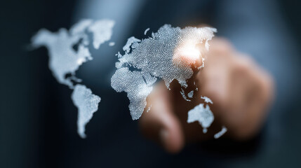 Person interacts with digital world map, showcasing global connectivity and technology. map is composed of small dots, representing data points across continents, emphasizing innovation