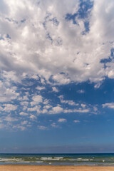 Storm at sea, clear weather with clouds in the sky, vertical posters with concept about meteorology...