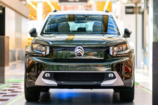Brno, Czech Republic - June 18, 2025: Green electric car Citroen C3. French modern smaller SUV, front view.