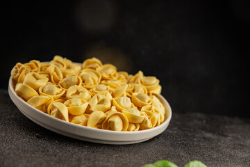 Ravioli raw filled homemade pasta filled raviolis tasty snack fresh delicious gourmet food background on the table rustic top view copy space vegetarian food