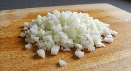 Dicing White Onions on Wooden Board