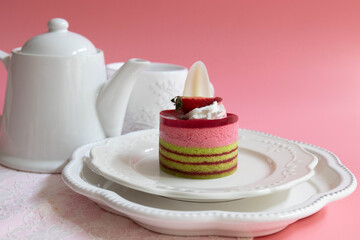 Dessert Concept , Strawberry cake on Pink Background