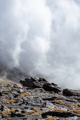 Cloudy over mountains on hiking trail to Mulhacen peak, Sierra Nevada National park, Andalusia, Spain