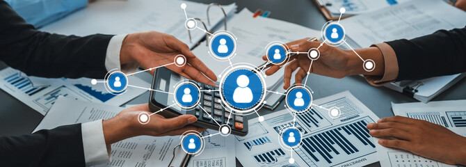 Explore the dynamic interaction between professionals as they engage in collaborative networking, utilizing data and technology for strategic business growth and planning. Amity