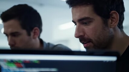 Programmers code review office teamwork - Powered by Adobe