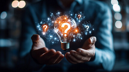 Person Holding Glowing Light Bulb Surrounded by Floating Question Marks Representing Creativity and Inquiry
