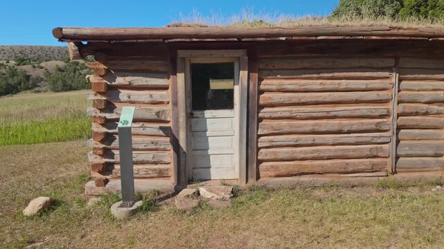 The historic buildings of the Ewing-Snell Ranch stand as a testament to the past against the beautiful backdrop of Bighorn Canyon