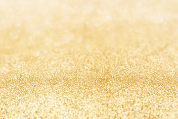 Bright golden glittery surface suitable for festive and celebratory design backgrounds