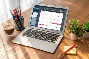Fototapeta premium Calendar on computer software application for modish schedule planning for personal organizer and online business