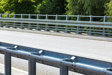 Steel highway guardrail on bridge – road safety infrastructure