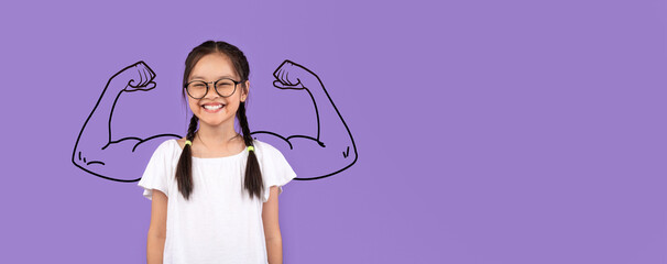 A young Asian girl confidently smiles while posing, her playful spirit highlighted by drawn biceps...