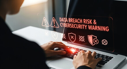 Person typing on laptop with data breach risk and cybersecurity warning displayed on the screen alert icons on transparent background