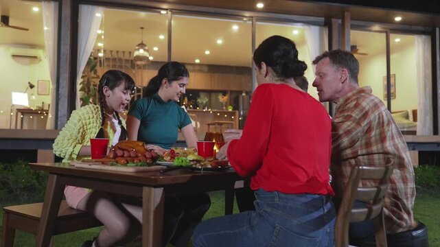 Family gather celebrate holiday. Parents, grandparents and girl together to talk and have dinner party food. Outdoor activity for spending time with cute relatives cross generation gap. Divergence.