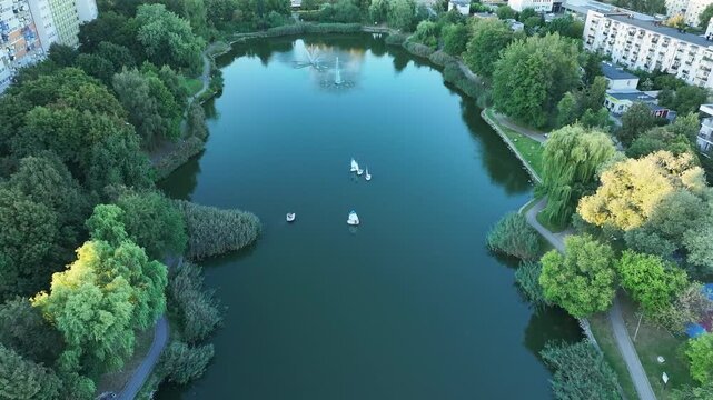 Bydgoszcz Poland sailboats city park lake. Northern Poland. Summer recreation, swimming, boats, sports. Historical trade transportation center. Modern architecture. City parks. EU.