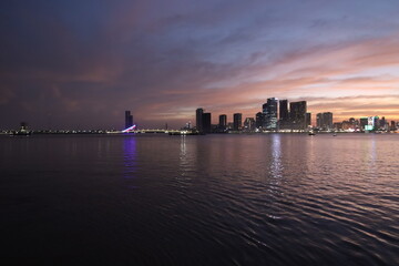 Fototapeta premium night time view from the ferry in the river pretty lights phnom penh cambodia
