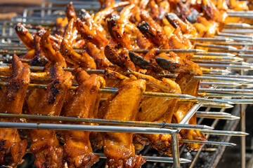 Barbeque chicken wing sold in a night market