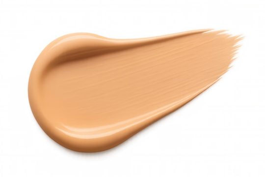 Beige foundation blending with makeup brush, spreading evenly and creating seamless, soft skin finish against transparent backdrop