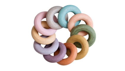 Colorful wooden rings arranged in a circular pattern.  A pastel-toned toy