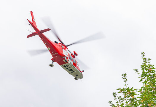 Medevac helicopter in the sky of Switzerland