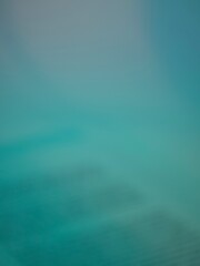 teal blue water surface variegated background 