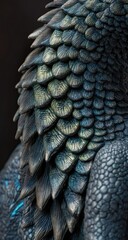 Fototapeta premium Close-up of a dragon's back, showcasing intricate scales and textures. Dark, deep blue-gray scales with golden highlights are densely packed, creating a three-dimensional effect
