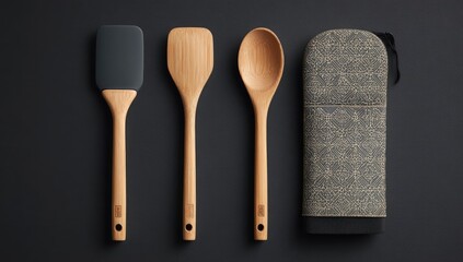Three wooden cooking utensils and a pot holder