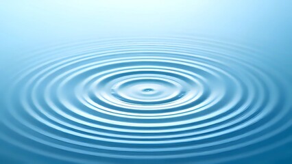 Tranquil Circles: Perfectly Symmetrical Water Ripples in Soft Blue