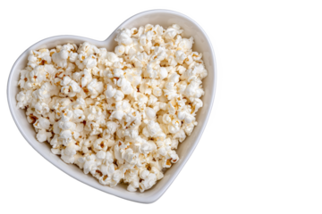 Popcorn in heart shaped bowl isolated on white transparent background